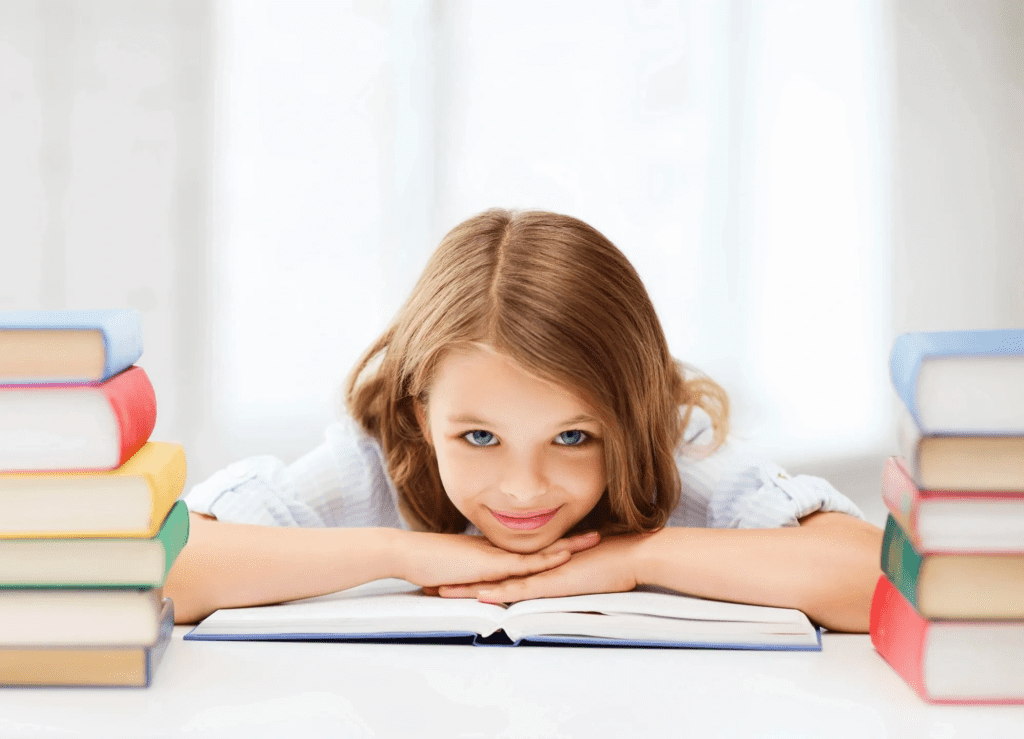 Girl Resting Her Head on an Open Book