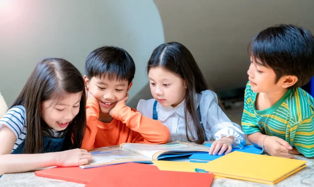 Four Siblings Reading Books Together