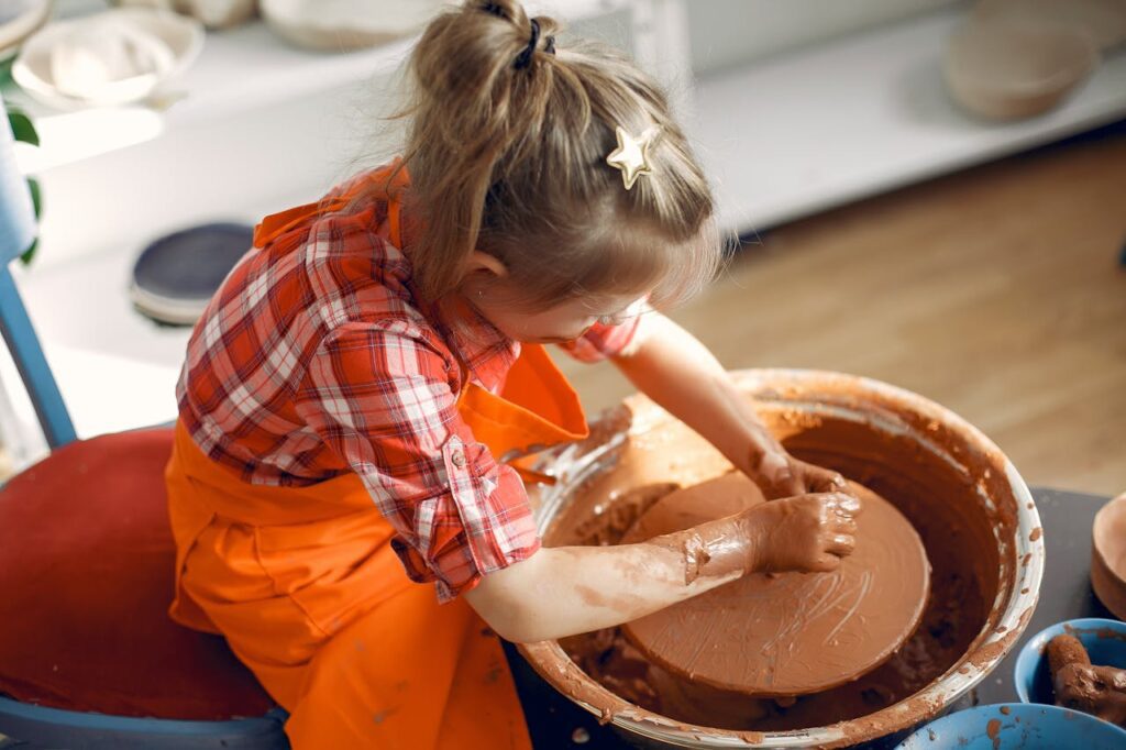 Girl at the Pottery Wheel