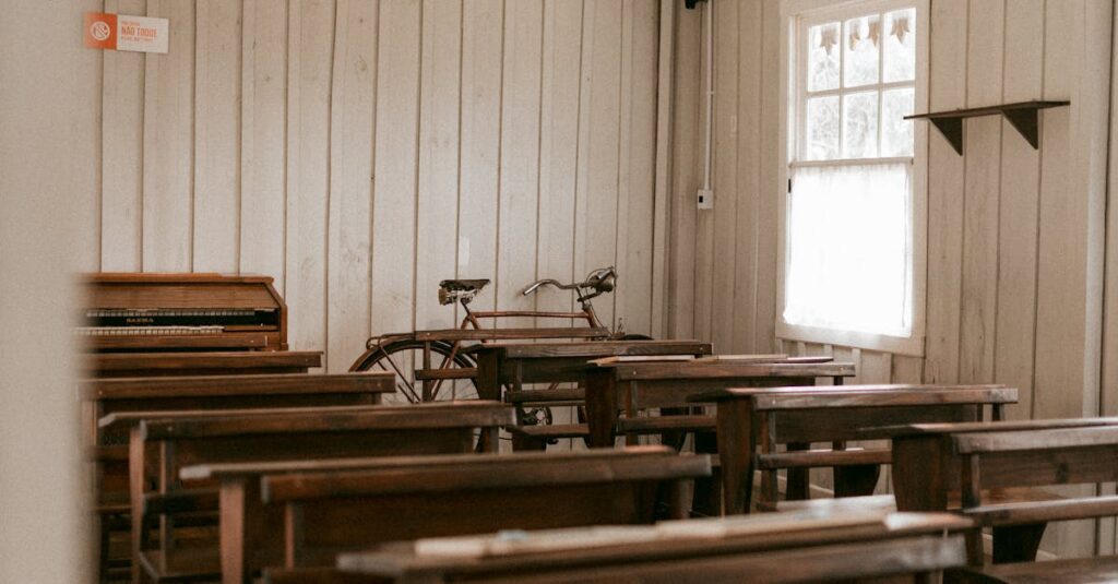 A classroom with wooden desks and chairs